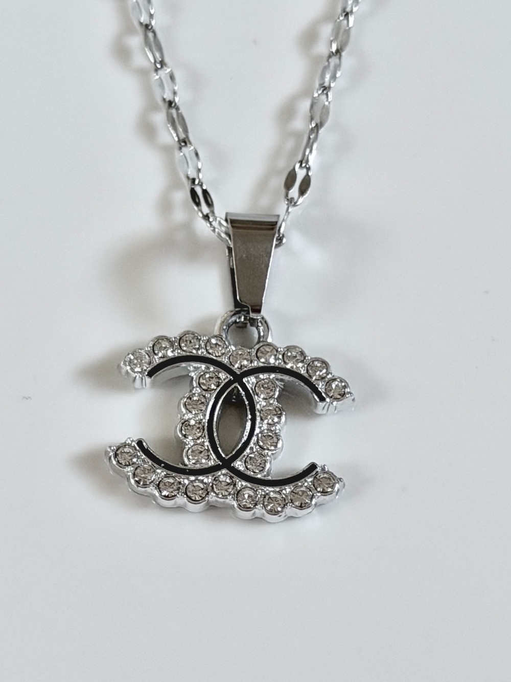 Crystal-Embellished Interlocking Logo Pendant Necklace in Silver